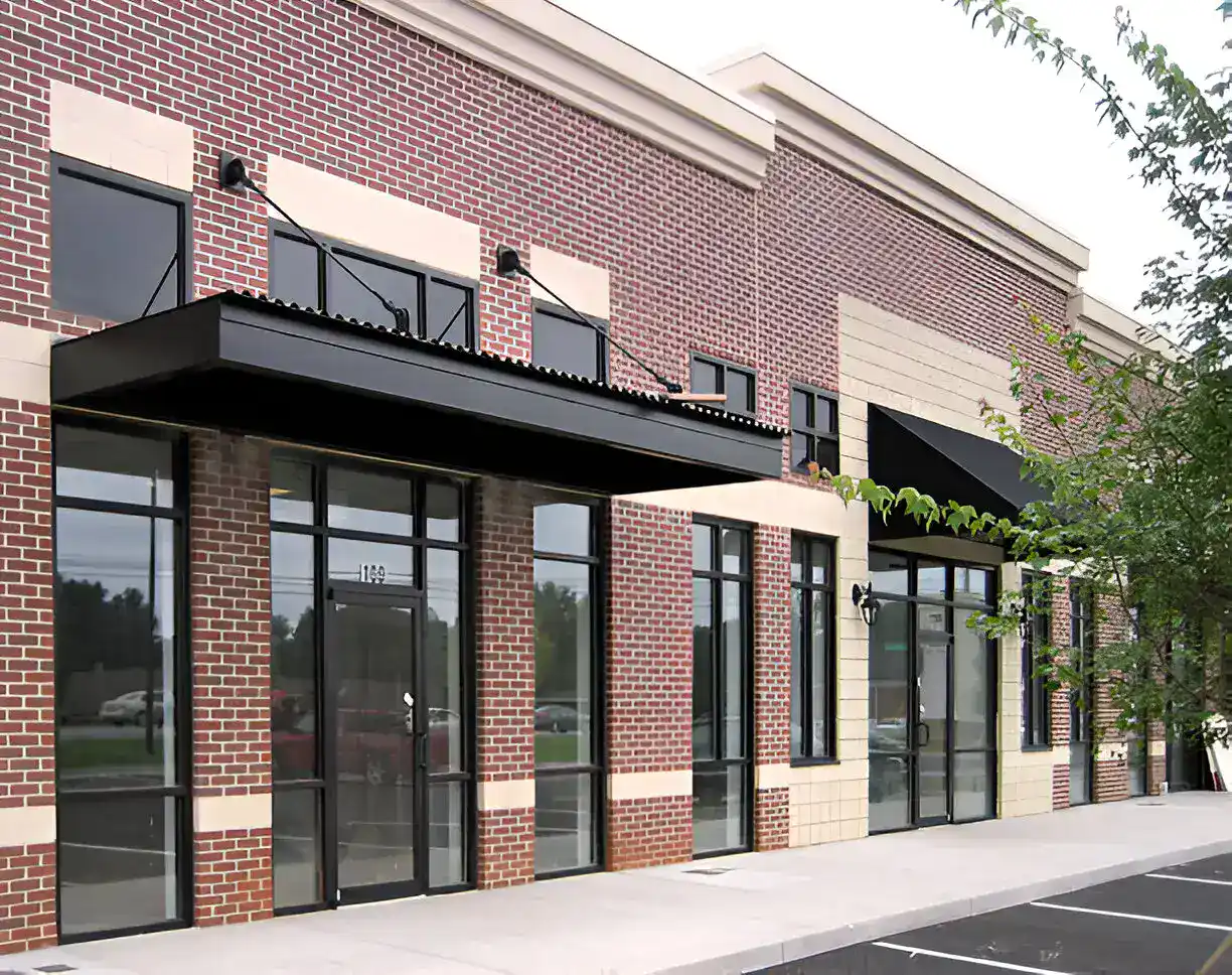 Skilled technicians providing Commercial Door Repairs Cochrane for businesses.