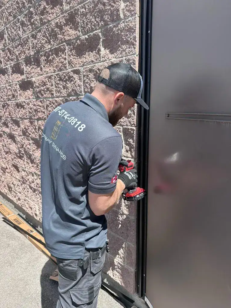 Door expert at work Doorway Dynamics - Commercial Door Repairs
