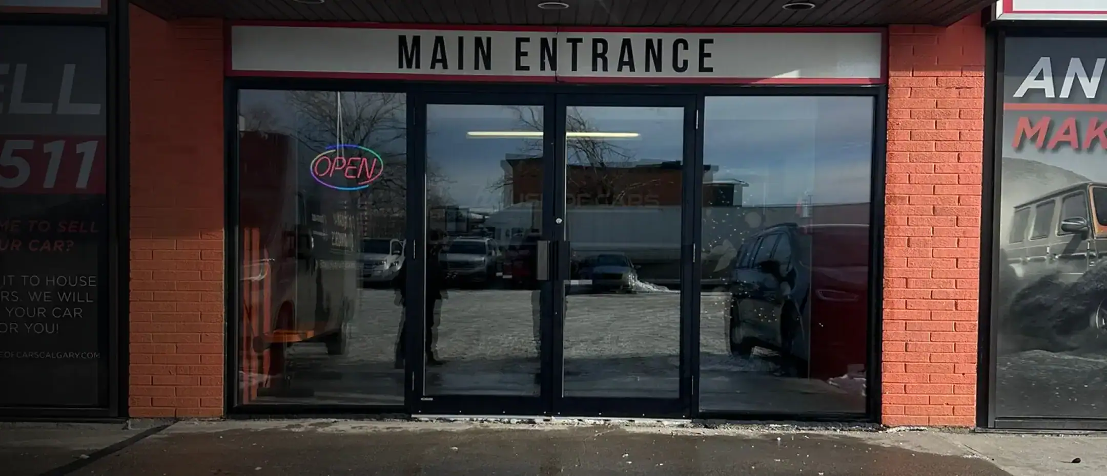 Homepage 24 Storefront glass main entrance upgraded with durable framing in commercial door repairs Calgary project.