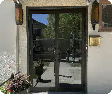 Homepage 22 Glass double door installed for an office entry during commercial door repairs Calgary service.