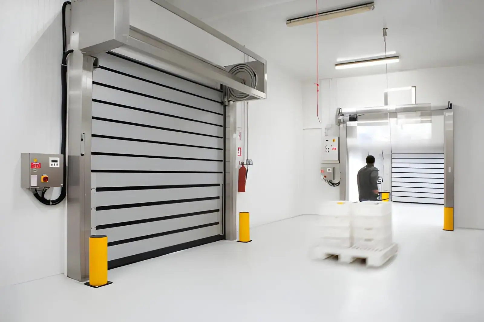 Technician performing Warehouse Door Repair on industrial door system